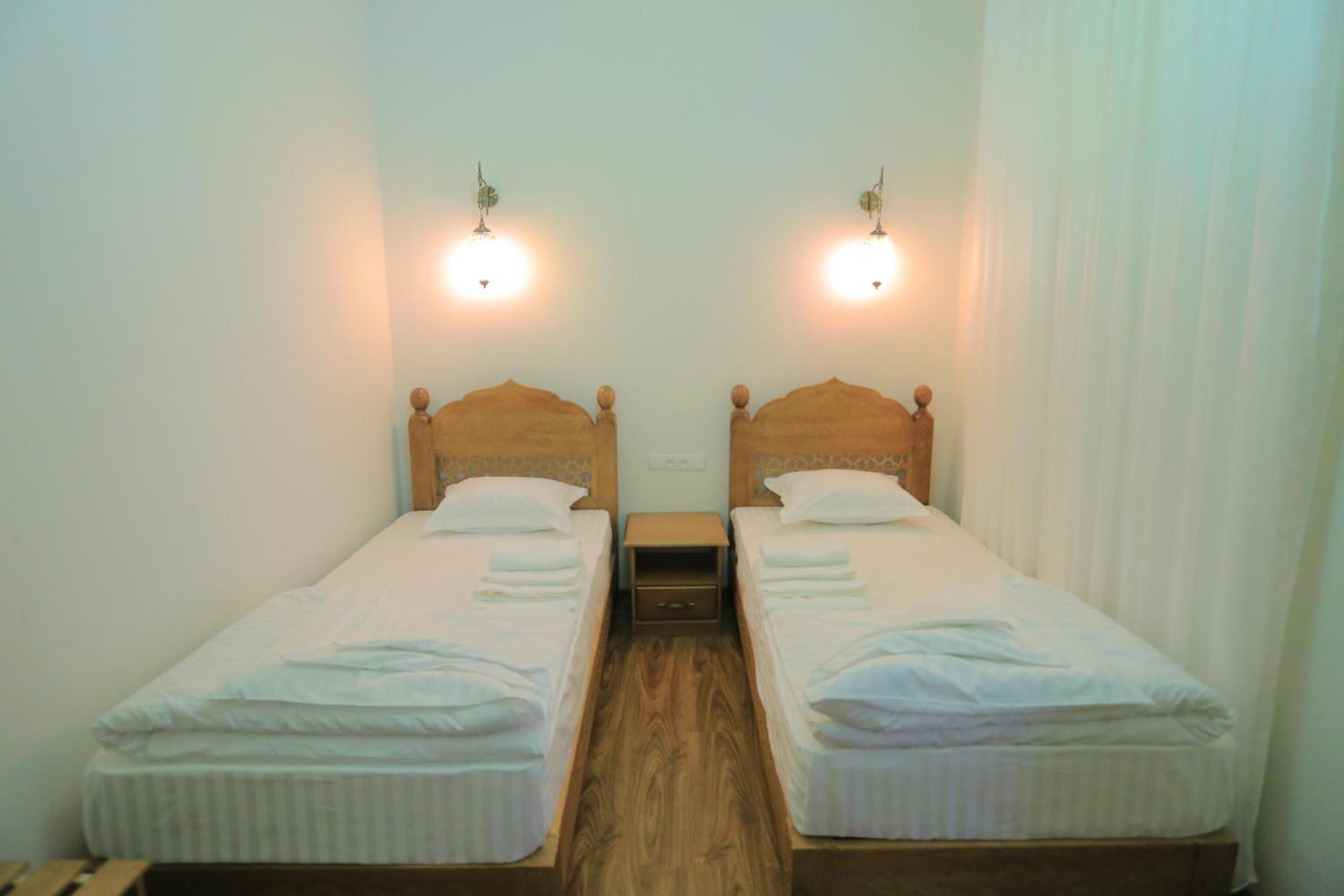 Guesthouse Muqaddam Boukhara Extérieur photo